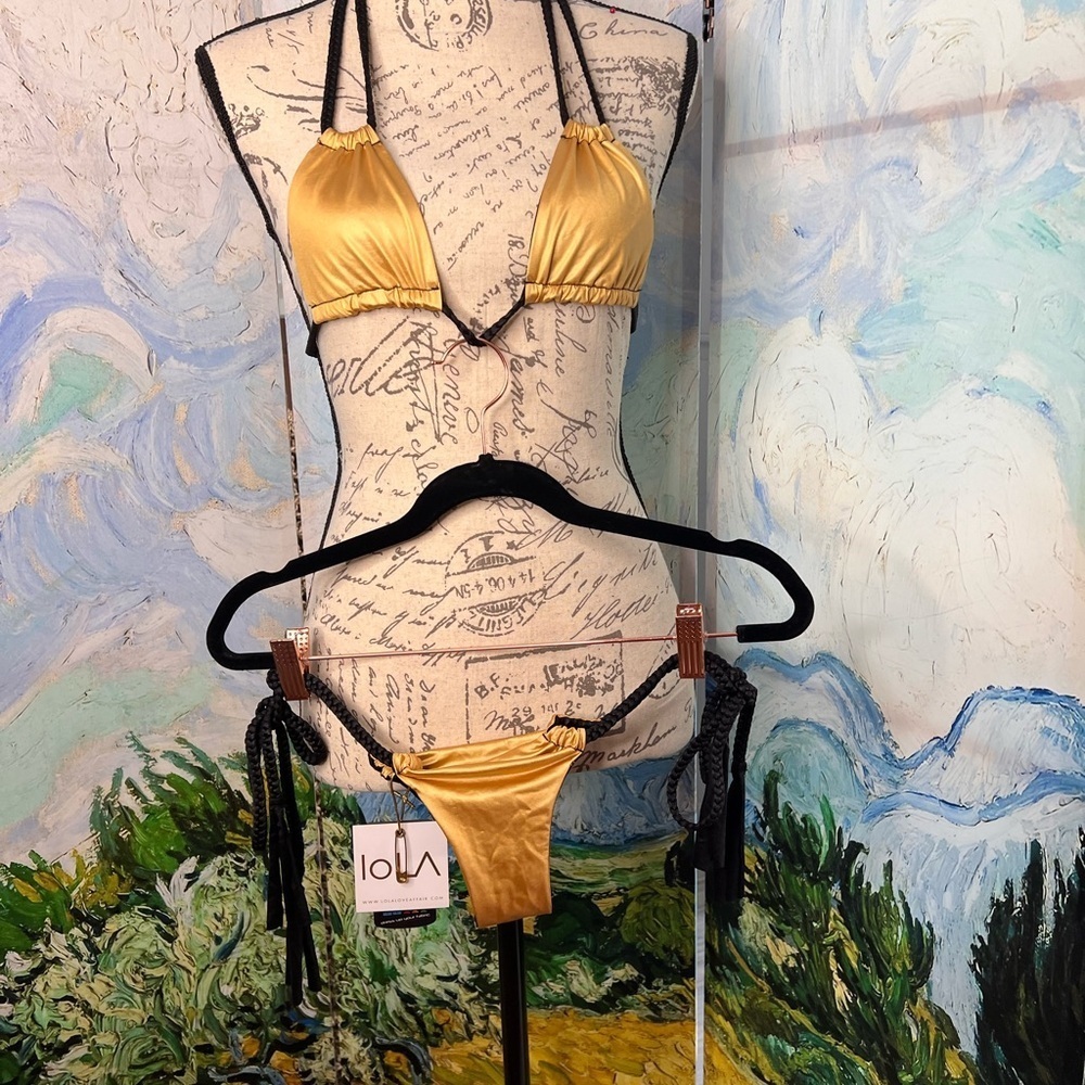 Lola love affair, gold, and black bikini. - Picture 5 of 10